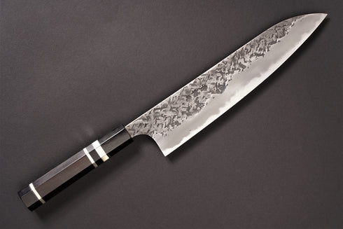 KISUKE MANAKA BLUE 1 HON-WARIKOMI KUROUCHI TSUCHIME GYUTO 240 WITH BLACK BUFFALO EBONY HANDLE / SILVER RINGS